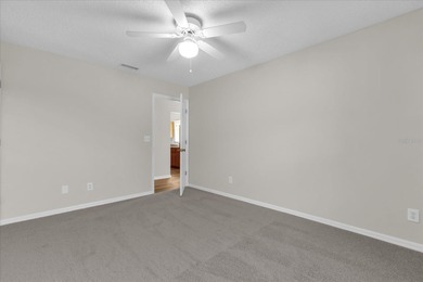 Under contract-accepting backup offers. Charming neighborhood on Green Valley Country Club in Florida - for sale on GolfHomes.com, golf home, golf lot