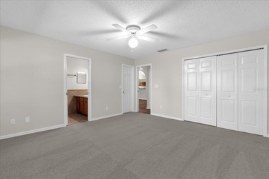 Under contract-accepting backup offers. Charming neighborhood on Green Valley Country Club in Florida - for sale on GolfHomes.com, golf home, golf lot