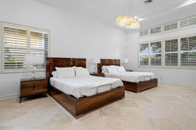 Spectacular lake & golf course estate in Mizner Country Club w/6 on Mizner Country Club in Florida - for sale on GolfHomes.com, golf home, golf lot