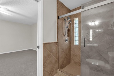 Under contract-accepting backup offers. Charming neighborhood on Green Valley Country Club in Florida - for sale on GolfHomes.com, golf home, golf lot