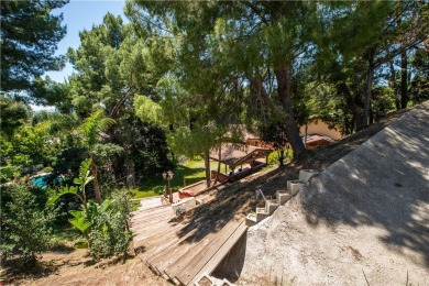 Welcome to this exceptionally private five-bedroom home in on Knollwood Golf Club in California - for sale on GolfHomes.com, golf home, golf lot