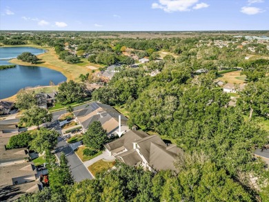 Under contract-accepting backup offers. Charming neighborhood on Green Valley Country Club in Florida - for sale on GolfHomes.com, golf home, golf lot