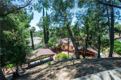 Welcome to this exceptionally private five-bedroom home in on Knollwood Golf Club in California - for sale on GolfHomes.com, golf home, golf lot
