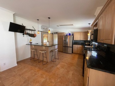Listed by the Official Sales Team of Cypress Lakes Village on Big Cypress Golf and Country Club in Florida - for sale on GolfHomes.com, golf home, golf lot