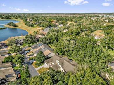 Under contract-accepting backup offers. Charming neighborhood on Green Valley Country Club in Florida - for sale on GolfHomes.com, golf home, golf lot