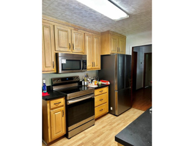 Are you looking for a one level living? This brick ranch home is on Princeton Elks Country Club in West Virginia - for sale on GolfHomes.com, golf home, golf lot
