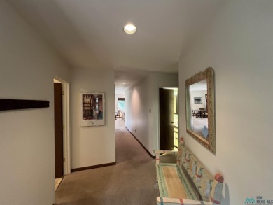 Take a look at this unique octagon home with easy year round on Pendaries Village Community Assoc. in New Mexico - for sale on GolfHomes.com, golf home, golf lot
