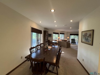 Take a look at this unique octagon home with easy year round on Pendaries Village Community Assoc. in New Mexico - for sale on GolfHomes.com, golf home, golf lot
