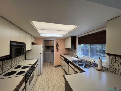 Take a look at this unique octagon home with easy year round on Pendaries Village Community Assoc. in New Mexico - for sale on GolfHomes.com, golf home, golf lot