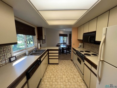 Take a look at this unique octagon home with easy year round on Pendaries Village Community Assoc. in New Mexico - for sale on GolfHomes.com, golf home, golf lot