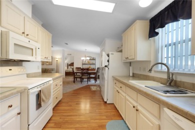 Fully furnished and spacious 27'x58' manufactured home. Built in on Maple Leaf Golf and Country Club in Florida - for sale on GolfHomes.com, golf home, golf lot