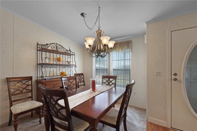 Fully furnished and spacious 27'x58' manufactured home. Built in on Maple Leaf Golf and Country Club in Florida - for sale on GolfHomes.com, golf home, golf lot