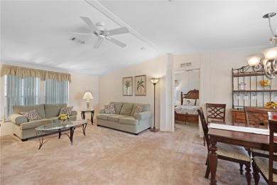 Fully furnished and spacious 27'x58' manufactured home. Built in on Maple Leaf Golf and Country Club in Florida - for sale on GolfHomes.com, golf home, golf lot