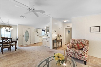 Fully furnished and spacious 27'x58' manufactured home. Built in on Maple Leaf Golf and Country Club in Florida - for sale on GolfHomes.com, golf home, golf lot