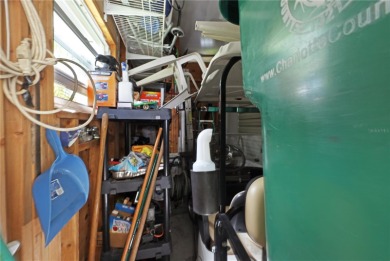 Fully furnished and spacious 27'x58' manufactured home. Built in on Maple Leaf Golf and Country Club in Florida - for sale on GolfHomes.com, golf home, golf lot