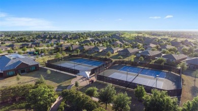 Looking for a vibrant active adult community? This home is low on Frisco Lakes Golf Course in Texas - for sale on GolfHomes.com, golf home, golf lot