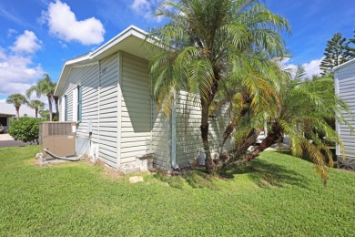 Fully furnished and spacious 27'x58' manufactured home. Built in on Maple Leaf Golf and Country Club in Florida - for sale on GolfHomes.com, golf home, golf lot