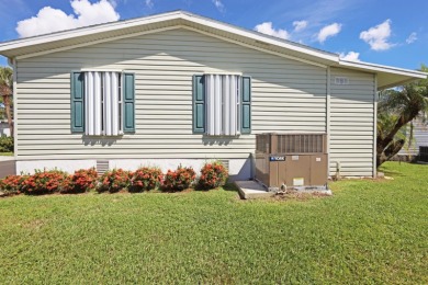 Fully furnished and spacious 27'x58' manufactured home. Built in on Maple Leaf Golf and Country Club in Florida - for sale on GolfHomes.com, golf home, golf lot