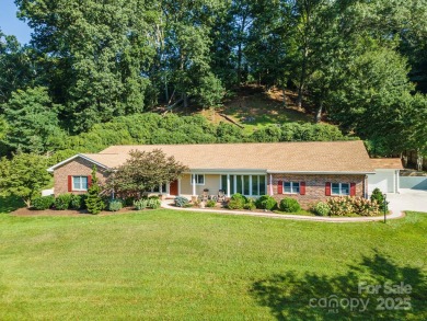This Charming Home Sits On A Beautifully Landscaped 1+Acre Lot on Laurel Ridge Country Club in North Carolina - for sale on GolfHomes.com, golf home, golf lot