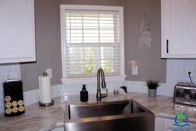 Step into this beautifully maintained home in the sought-after on Cypresswood Golf and Country Club in Florida - for sale on GolfHomes.com, golf home, golf lot