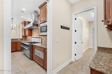 This meticulously crafted custom home, in the exclusive gated on Duran Golf Course in Florida - for sale on GolfHomes.com, golf home, golf lot