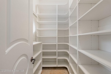 This meticulously crafted custom home, in the exclusive gated on Duran Golf Course in Florida - for sale on GolfHomes.com, golf home, golf lot