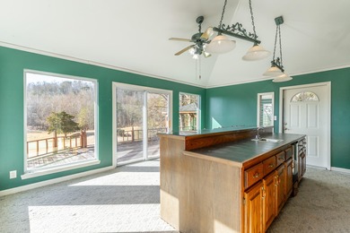 Welcome to this wonderful home overlooking the 12th green the on Dayton Golf and Country Club in Tennessee - for sale on GolfHomes.com, golf home, golf lot