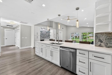 Welcome to luxury living in Eastpointe Country Club! This on Eastpointe Country Club in Florida - for sale on GolfHomes.com, golf home, golf lot