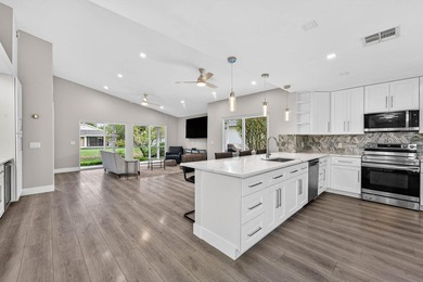 Welcome to luxury living in Eastpointe Country Club! This on Eastpointe Country Club in Florida - for sale on GolfHomes.com, golf home, golf lot