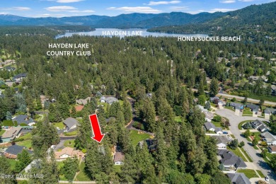 This beautifully updated 4 bed / 3 bath home sits on a spacious on Hayden Lake Country Club in Idaho - for sale on GolfHomes.com, golf home, golf lot