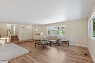 This beautifully updated 4 bed / 3 bath home sits on a spacious on Hayden Lake Country Club in Idaho - for sale on GolfHomes.com, golf home, golf lot