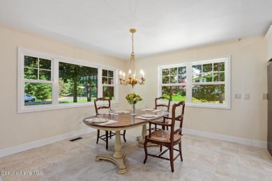 This beautifully updated 4 bed / 3 bath home sits on a spacious on Hayden Lake Country Club in Idaho - for sale on GolfHomes.com, golf home, golf lot