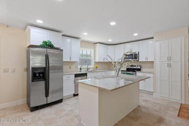 This beautifully updated 4 bed / 3 bath home sits on a spacious on Hayden Lake Country Club in Idaho - for sale on GolfHomes.com, golf home, golf lot