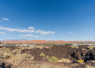 Don't miss this rare opportunity to own a stunning 0.63-acre lot on Entrada at Snow Canyon in Utah - for sale on GolfHomes.com, golf home, golf lot