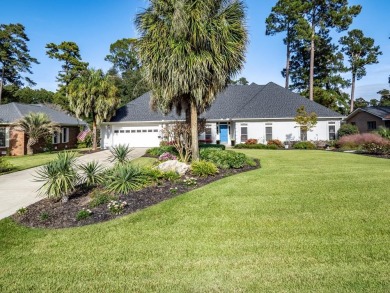 Absolutely gorgeous home with fantastic landscaping and views of on Santee-Cooper Country Club in South Carolina - for sale on GolfHomes.com, golf home, golf lot