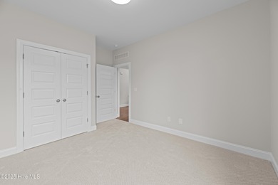 BUILDER NOW OFFERING $15,000 USE AS YOU CHOOSE - must close by on Carolina Colours Golf Club in North Carolina - for sale on GolfHomes.com, golf home, golf lot