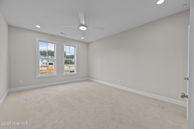 BUILDER NOW OFFERING $15,000 USE AS YOU CHOOSE - must close by on Carolina Colours Golf Club in North Carolina - for sale on GolfHomes.com, golf home, golf lot