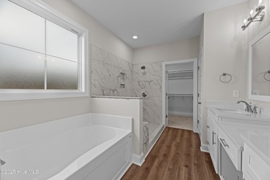 BUILDER NOW OFFERING $15,000 USE AS YOU CHOOSE - must close by on Carolina Colours Golf Club in North Carolina - for sale on GolfHomes.com, golf home, golf lot