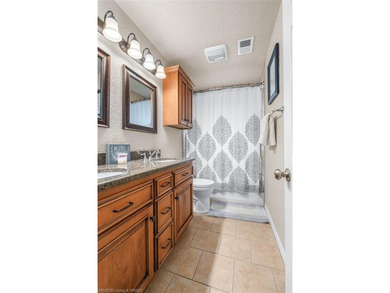 Gorgeous 4 bed 3 full bath home in Bellwood subdivision with on Vache-Grasse Country Club in Arkansas - for sale on GolfHomes.com, golf home, golf lot