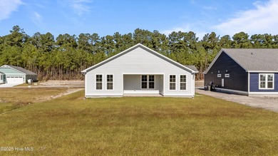 BUILDER NOW OFFERING $15,000 USE AS YOU CHOOSE - must close by on Carolina Colours Golf Club in North Carolina - for sale on GolfHomes.com, golf home, golf lot