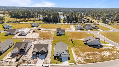 BUILDER NOW OFFERING $15,000 USE AS YOU CHOOSE - must close by on Carolina Colours Golf Club in North Carolina - for sale on GolfHomes.com, golf home, golf lot