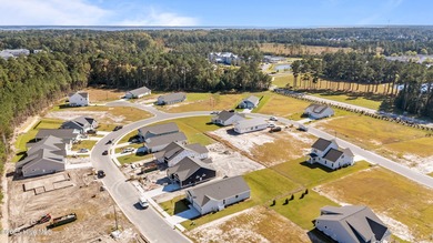 BUILDER NOW OFFERING $15,000 USE AS YOU CHOOSE - must close by on Carolina Colours Golf Club in North Carolina - for sale on GolfHomes.com, golf home, golf lot