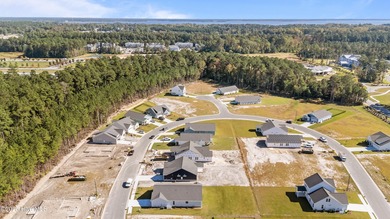 BUILDER NOW OFFERING $15,000 USE AS YOU CHOOSE - must close by on Carolina Colours Golf Club in North Carolina - for sale on GolfHomes.com, golf home, golf lot