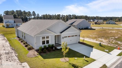 BUILDER NOW OFFERING $15,000 USE AS YOU CHOOSE - must close by on Carolina Colours Golf Club in North Carolina - for sale on GolfHomes.com, golf home, golf lot