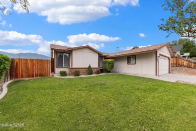 This three-bedroom, two-bath home spans 1,259 square feet and is on Sun Ridge Golf Course in Nevada - for sale on GolfHomes.com, golf home, golf lot