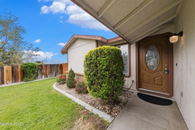 This three-bedroom, two-bath home spans 1,259 square feet and is on Sun Ridge Golf Course in Nevada - for sale on GolfHomes.com, golf home, golf lot