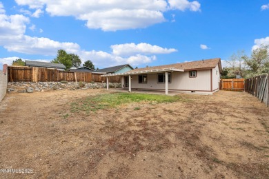 This three-bedroom, two-bath home spans 1,259 square feet and is on Sun Ridge Golf Course in Nevada - for sale on GolfHomes.com, golf home, golf lot