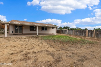This three-bedroom, two-bath home spans 1,259 square feet and is on Sun Ridge Golf Course in Nevada - for sale on GolfHomes.com, golf home, golf lot