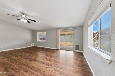 This three-bedroom, two-bath home spans 1,259 square feet and is on Sun Ridge Golf Course in Nevada - for sale on GolfHomes.com, golf home, golf lot
