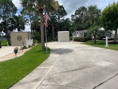 This RV site offers fantastic golf course views of the 14th on The Great Outdoors Golf and Country Club in Florida - for sale on GolfHomes.com, golf home, golf lot